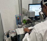 Laser engraving technician at work