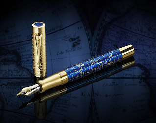 Gold fountain pen on vintage map